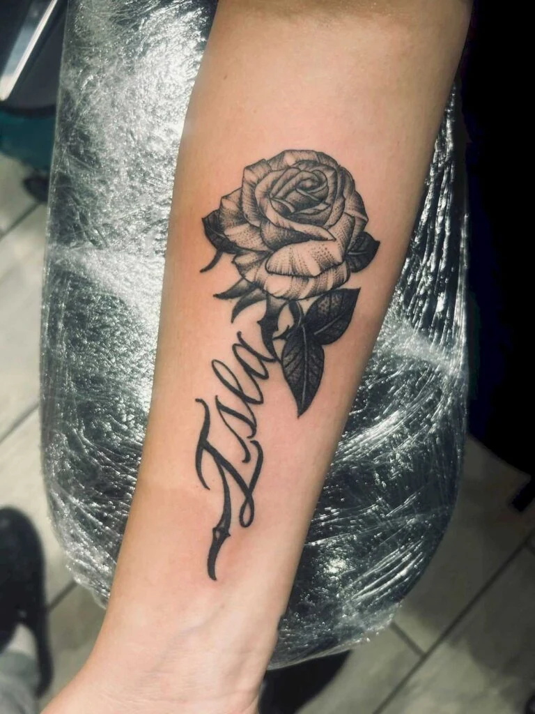 Student work: rose and lettering tattoo